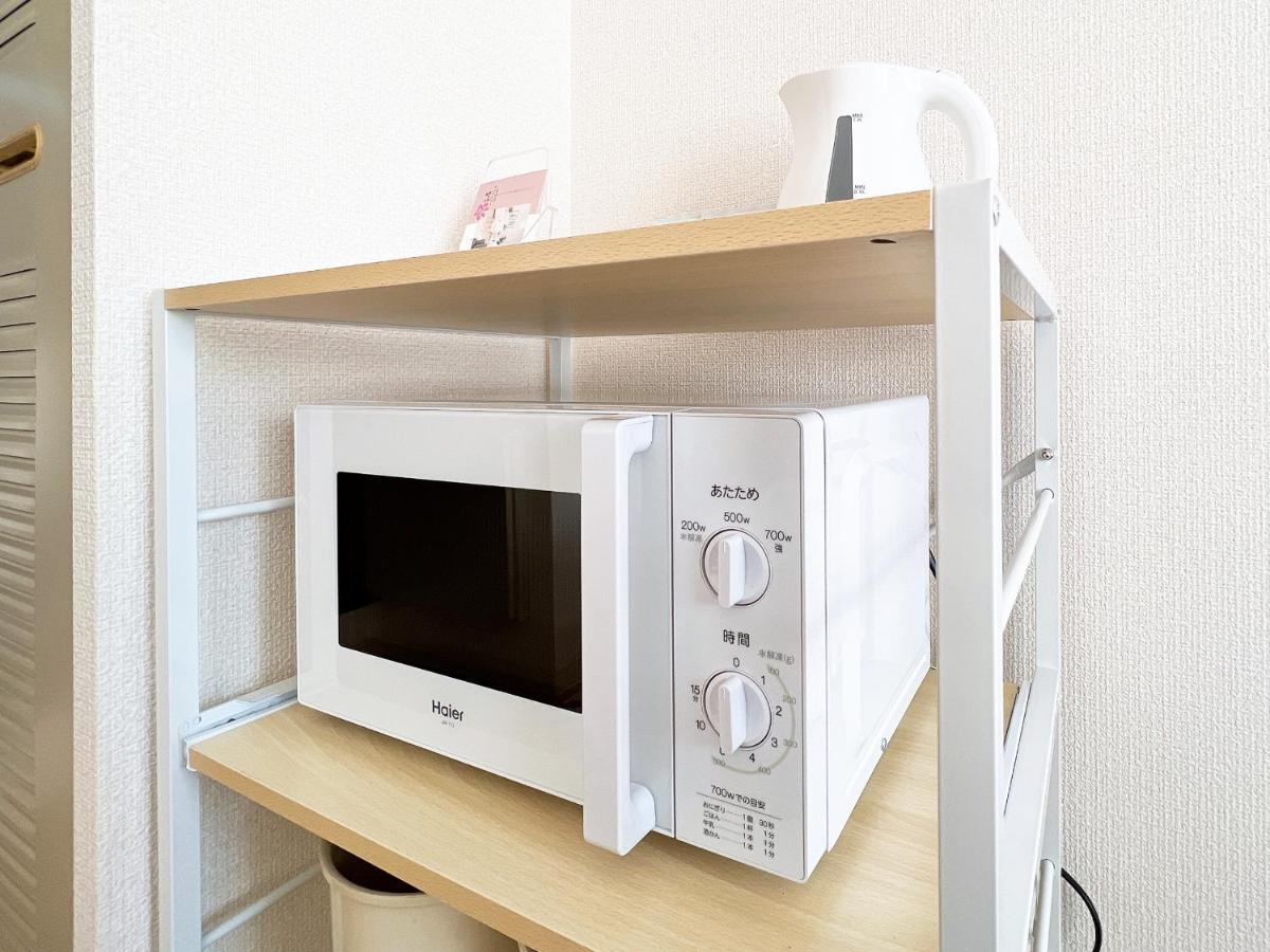 Ouchi Hotel Nishi-Tokaichi Hiroshima Esterno foto